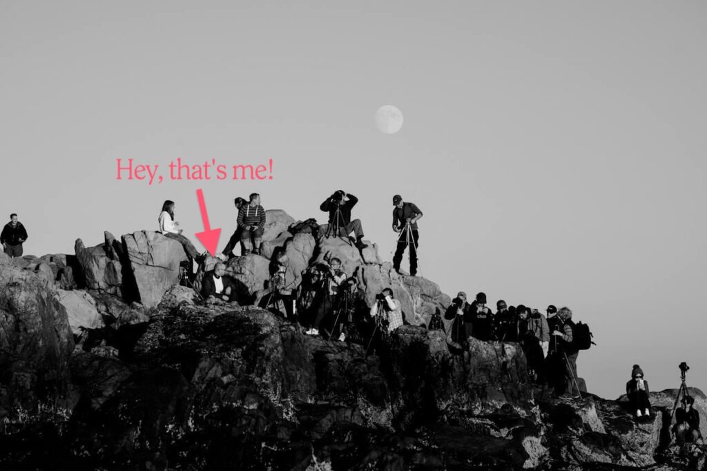 This is me sitting on uncomfortable rocks, waiting for the sunset to photograph the Bass Harbor Lighthouse in Maine. There were countless additional photographers around the area, all enjoying the fresh air and outdoors.